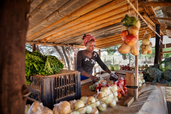 African,Street,Vendor,,Selling,Onions,,Cabbage,,Tomatoes.