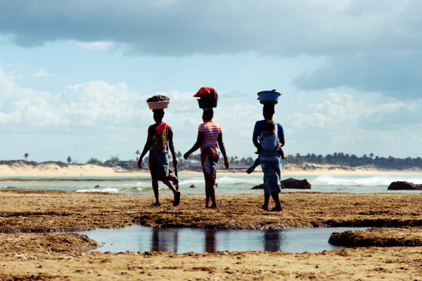 Mozambique,Women,Carrying,Basket,On,The,Head,And,Baby,Behind